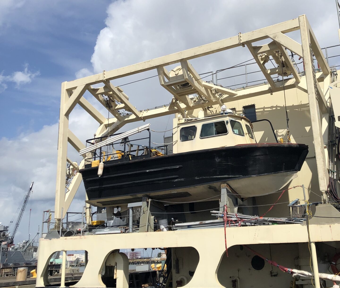 Photo of a F davit system mounted onboard a vessel
